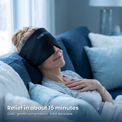 Woman relaxing with the CoolHalo 360 degree cooling wrap over her eyes